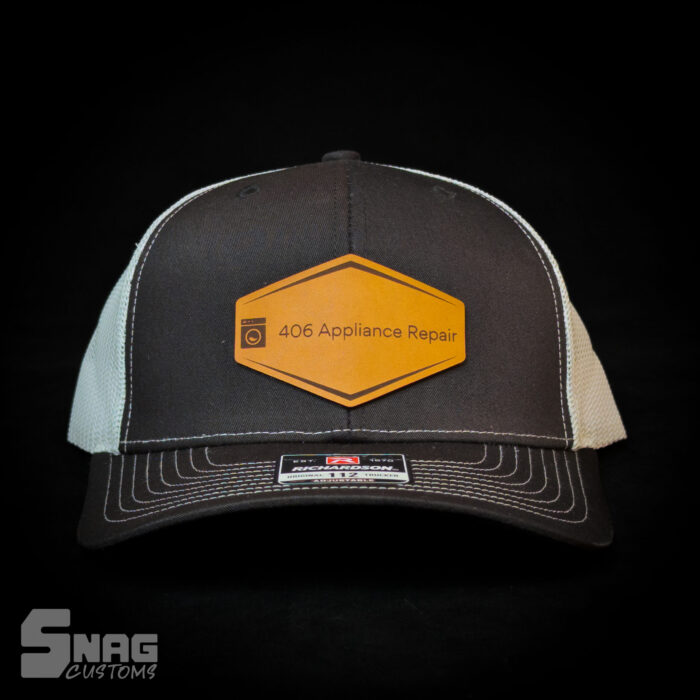 custom laser engraved leather patch on richardson 112 115 yupoong hat. hermann oak leather. laser engraved in montana, usa