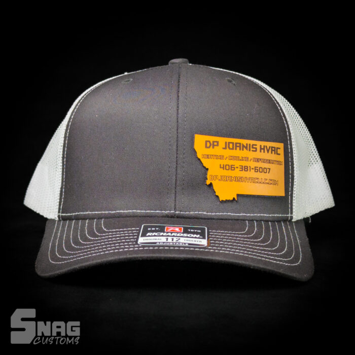 custom laser engraved leather patch on richardson 112 115 yupoong hat. hermann oak leather. laser engraved in montana, usa