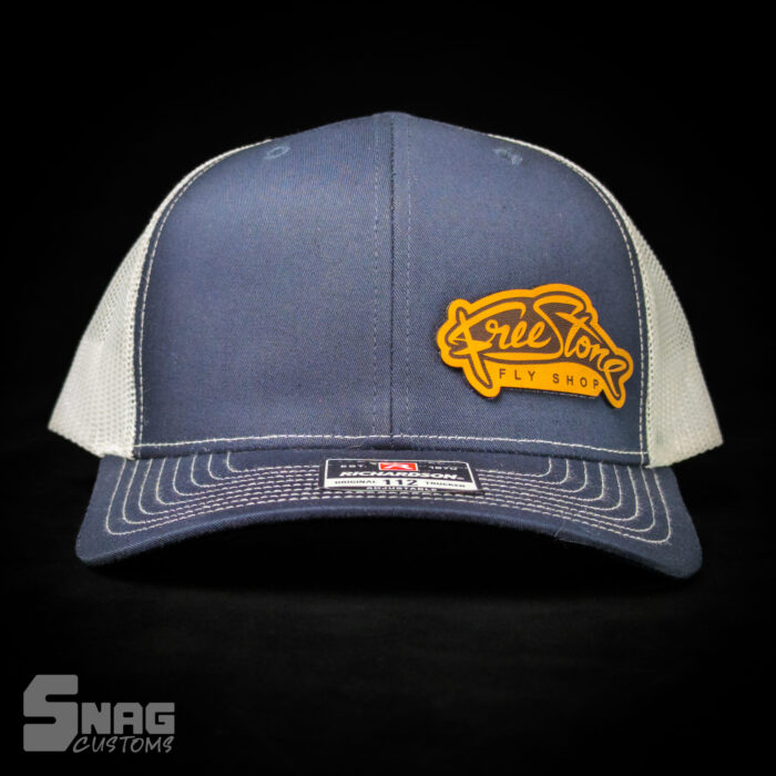 custom laser engraved leather patch on richardson 112 115 yupoong hat. hermann oak leather. laser engraved in montana, usa