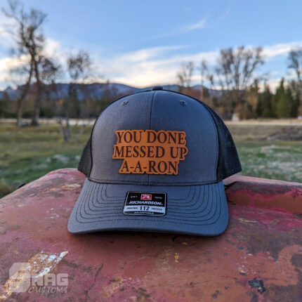 custom laser engraved leather patch on richardson 112 115 yupoong hat. hermann oak leather. laser engraved in montana, usa