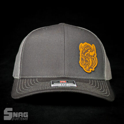 custom laser engraved leather patch on richardson 112 115 yupoong hat. hermann oak leather. laser engraved in montana, usa